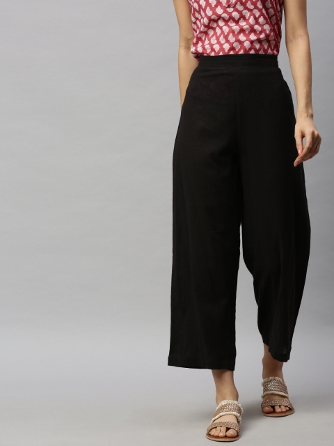 

Aprique FAB Women Black Solid Straight Palazzos