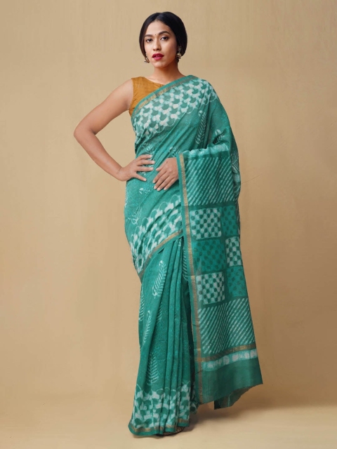 

Unnati Silks Sea Green & White Silk Cotton Dabu Printed Chanderi Saree