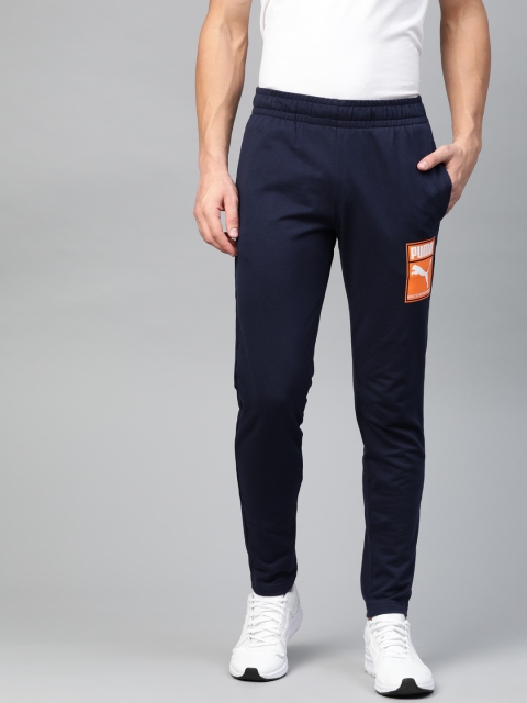 

Puma Men Navy Blue Solid Slim Fit Box Graphic Track Pants