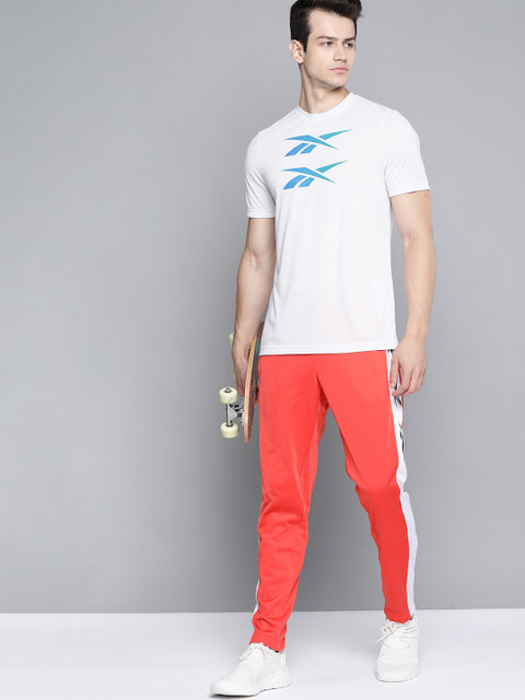 

Reebok Men White & Blue CO/PES Brand Logo Recycled Polyester Slim Fit Training T-shirt