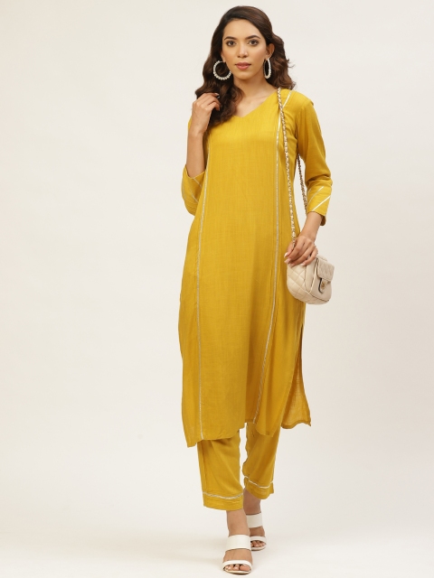 

MIRA Women Mustard Yellow Solid Kurta with Trousers