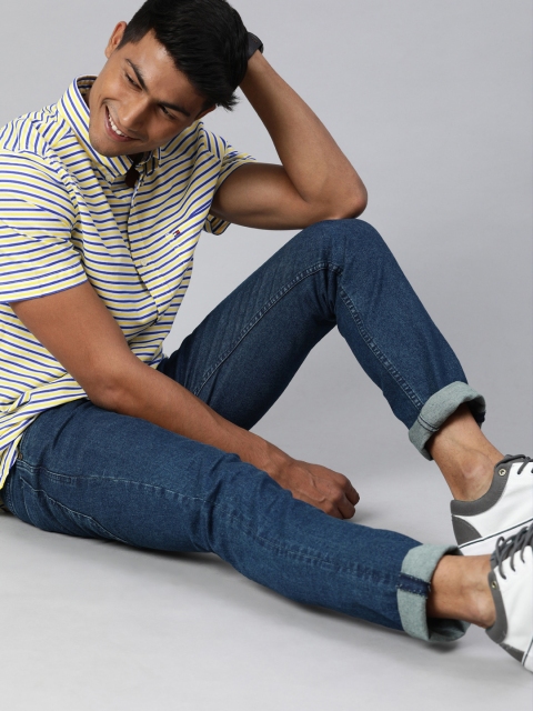 

Tommy Hilfiger Men Yellow & Blue Regular Fit Striped Casual Shirt