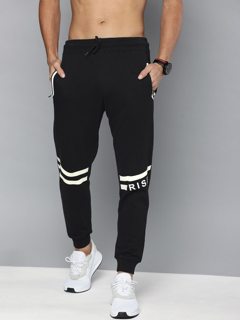 

HERE&NOW Men Black Solid Joggers with Striped Detail