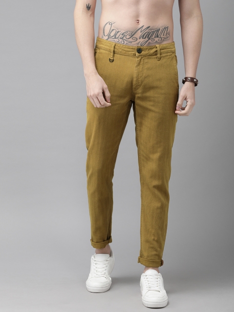 

Roadster Men Khaki Regular Fit Herringbone Self Design Regular Trousers
