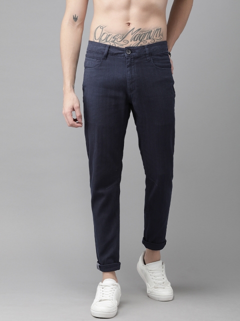 

Roadster Men Navy Blue Regular Fit Self Design Regular Trousers