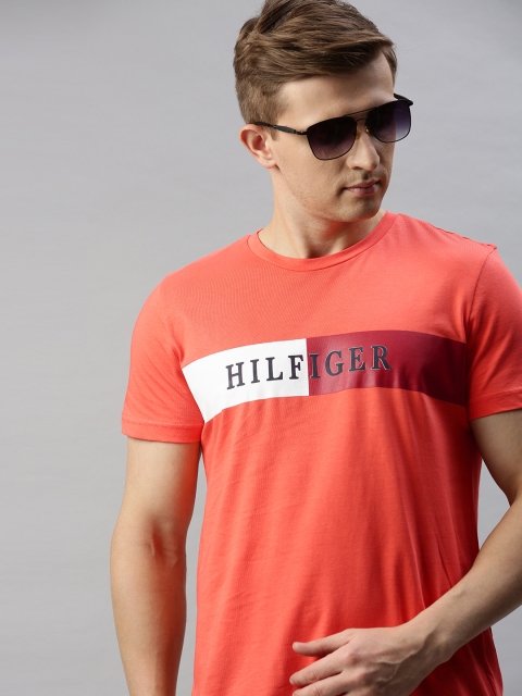

Tommy Hilfiger Men Orange Printed Round Neck T-shirt