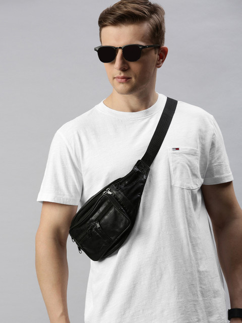 

Tommy Hilfiger Men White Solid Round Neck T-shirt With Chest Pocket