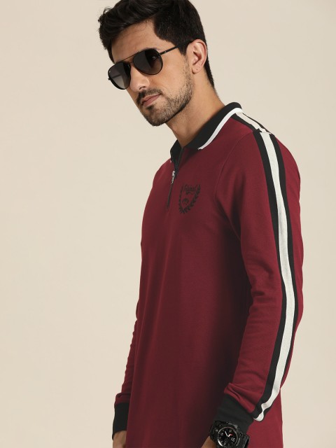 

Moda Rapido Men Maroon Solid Polo Collar T-shirt with Side Stripes