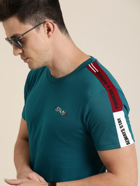 

Moda Rapido Men Teal Blue Solid Round Neck Pure Cotton T-shirt With Printed Detailing
