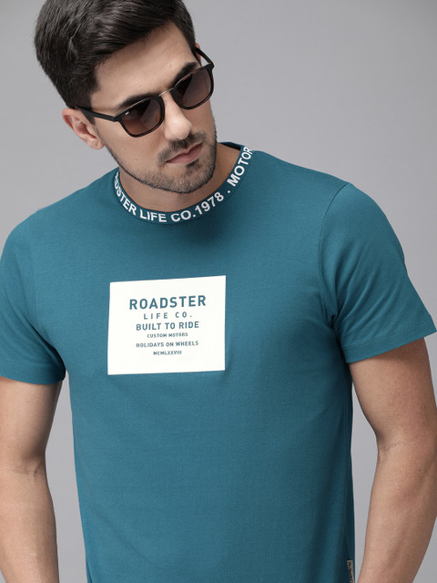 

Roadster Men Teal Blue & White Brand Logo Print Pure Cotton Round Neck T-shirt