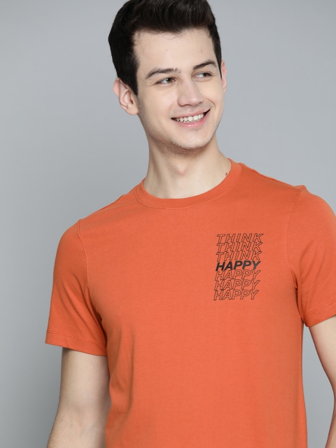 

Mast & Harbour Men Rust Orange Solid Round Neck T-shirt