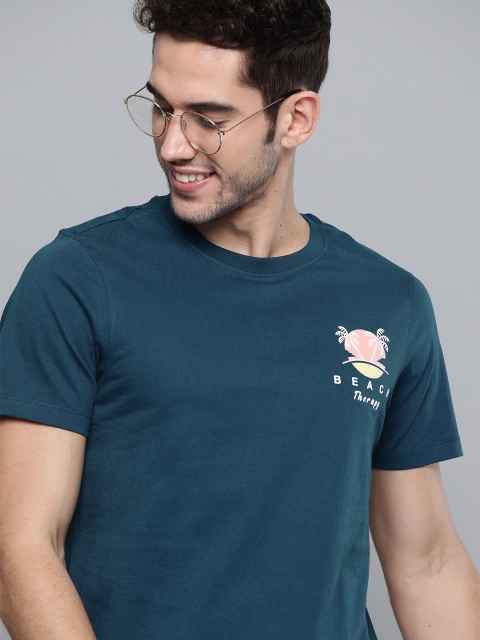 

Mast & Harbour Men Teal Blue Solid Round Neck T-shirt