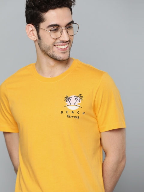 

Mast & Harbour Men Yellow Solid Pure Cotton Round Neck T-shirt