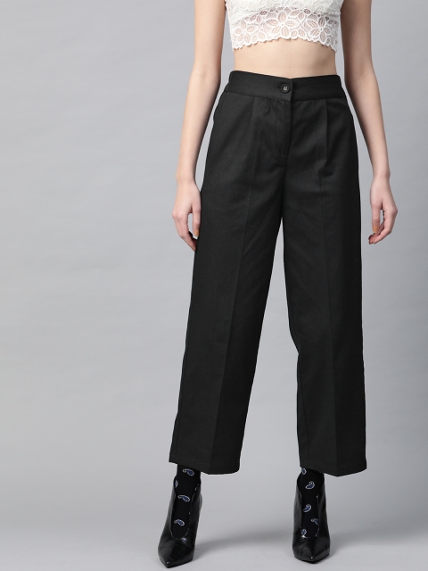 

SASSAFRAS Women Black Tapered Fit Solid Parallel Trousers