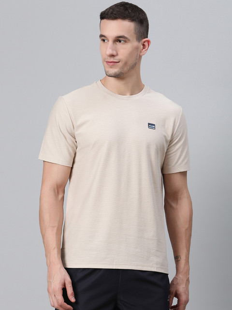 

Alcis Men Beige Solid Round Neck T-shirt
