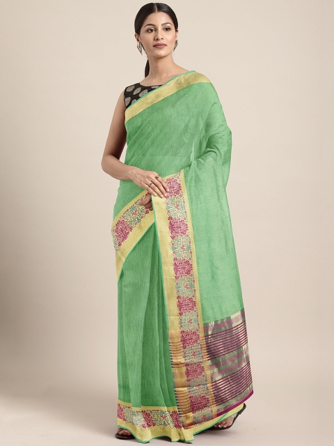 

Neerus Sea Green & Purple Silk Cotton Solid Saree