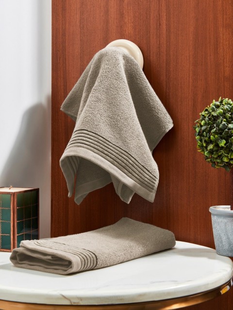 

DDecor Unisex Set Of 2 Beige Solid 500 GSM Live Beautiful Hand Towels