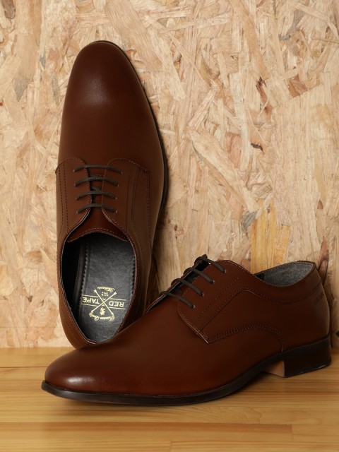

Red Tape Men Brown Solid Leather Formal Derbys