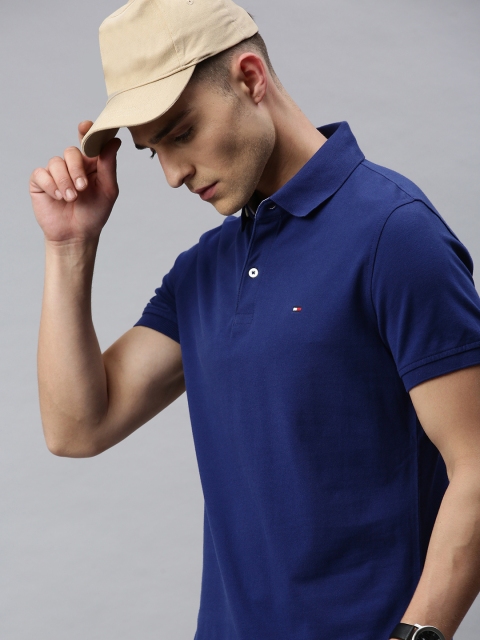 

Tommy Hilfiger Men Blue Solid Polo Collar T-shirt