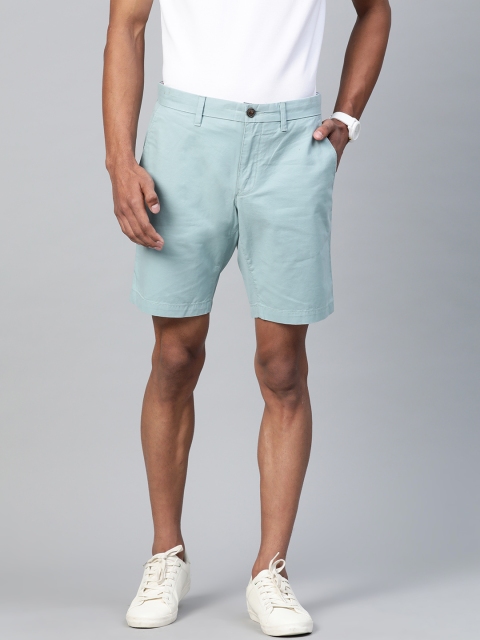 

Tommy Hilfiger Men Blue Solid Regular Fit Regular Shorts