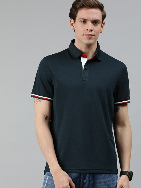 

Tommy Hilfiger Men Navy Blue Solid Polo Collar T-shirt