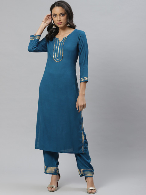 

Vasudha Women Teal Blue Solid Kurta with Trousers