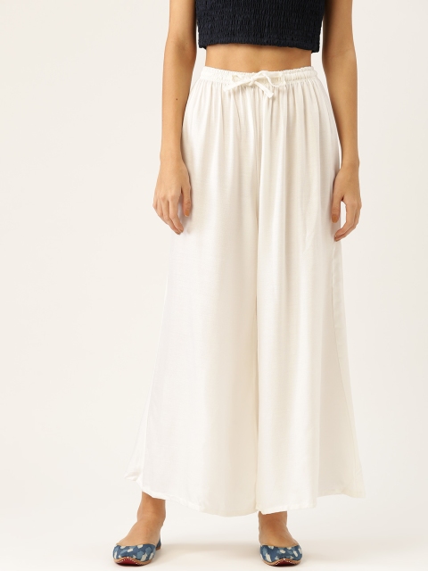 

Vastraa Fusion Women White Solid Flared Palazzos