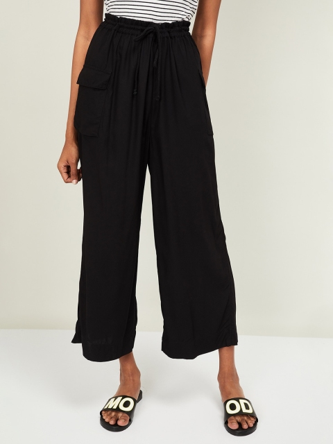 

Ginger by Lifestyle Women Black Solid Straight Palazzos