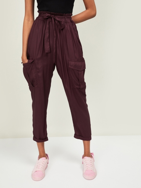 

Ginger by Lifestyle Women Burgundy Tapered Fit Solid Regular Trousers