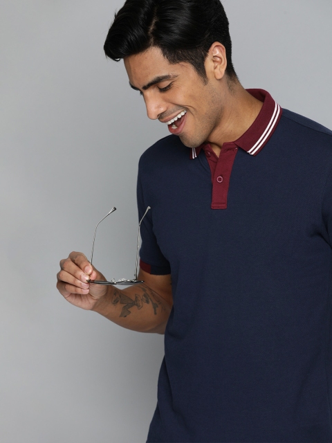 

HERE&NOW Men Navy Blue Solid Polo Collar T-shirt