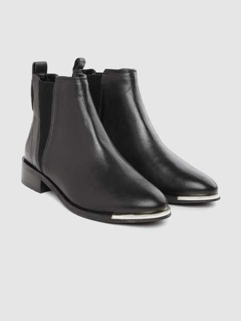 

Marks & Spencer Women Black Solid Leather Mid-Top Flat Boots