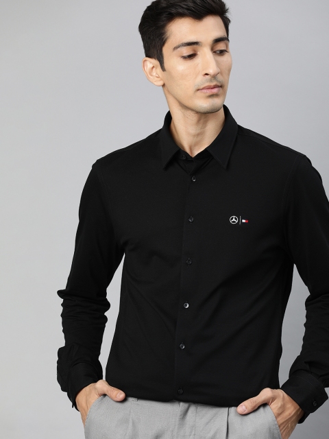 

Tommy Hilfiger Men Black Slim Fit Solid Formal Shirt