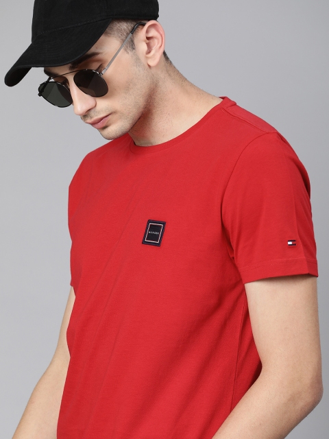 

Tommy Hilfiger Men Red Solid Round Neck T-shirt with Applique Detail