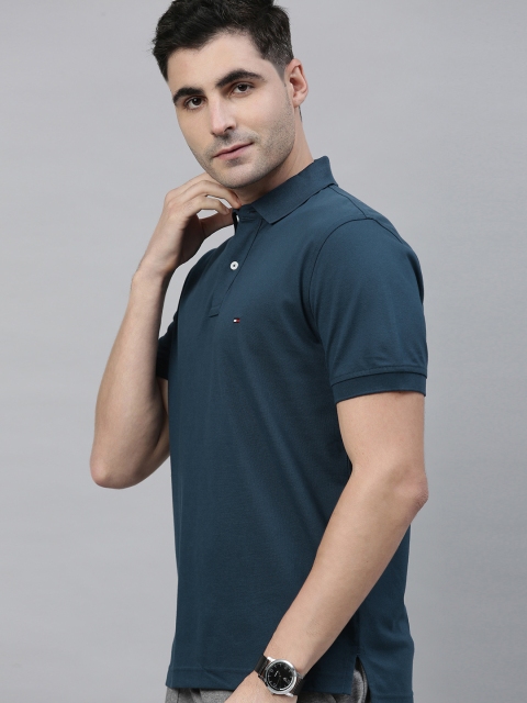 

Tommy Hilfiger Men Blue Solid Polo Collar T-shirt