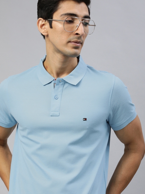 

Tommy Hilfiger Men Blue Solid Polo Collar T-shirt