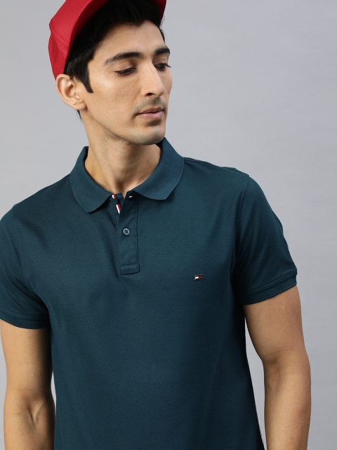 

Tommy Hilfiger Men Teal Blue Solid Polo Collar T-shirt