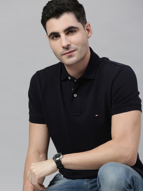

Tommy Hilfiger Men Navy Blue Solid Polo Collar T-shirt
