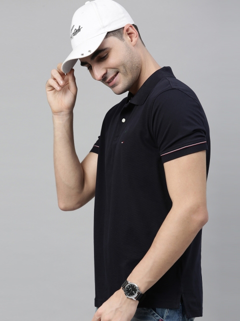 

Tommy Hilfiger Men Navy Blue Solid Polo Collar T-shirt