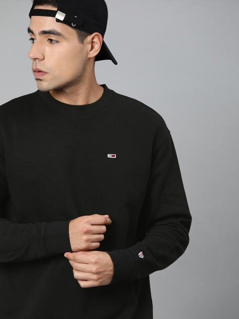 

Tommy Hilfiger Men Black Solid Sweatshirt