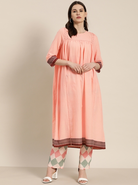 

Moda Rapido Women Pink Pure Cotton Solid Kurta with Palazzos