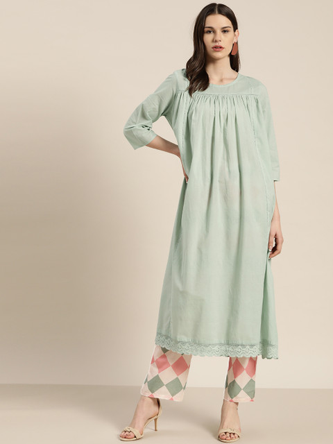 

Moda Rapido Women Sea Green Pure Cotton Solid Kurta with Palazzos