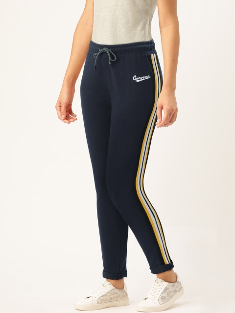 

Women Navy blue Solid Slim Fit Track Pants With Side Stripes