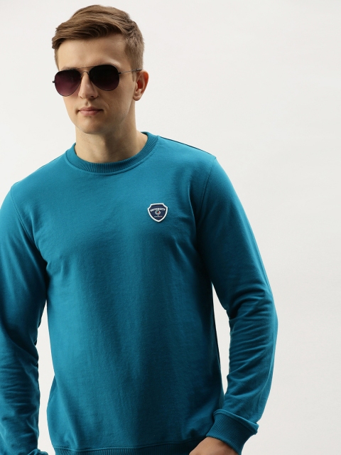 

PETER ENGLAND UNIVERSITY Men Teal Blue Solid Sweatshirt