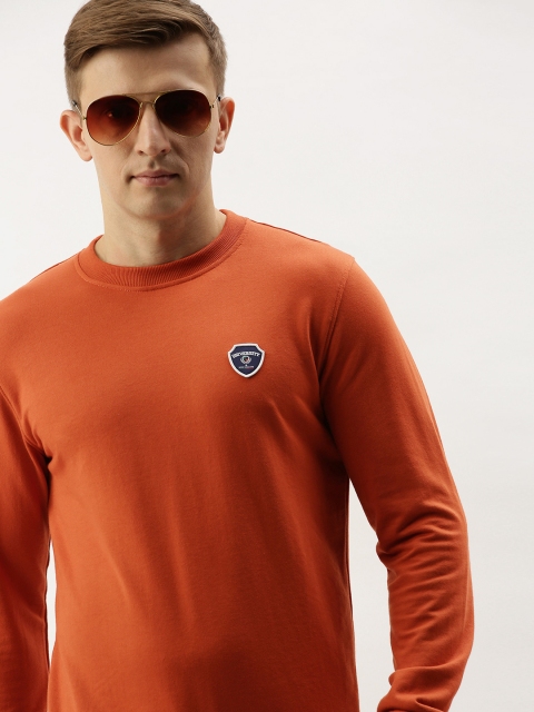 

PETER ENGLAND UNIVERSITY Men Coral Red Solid Sweatshirt