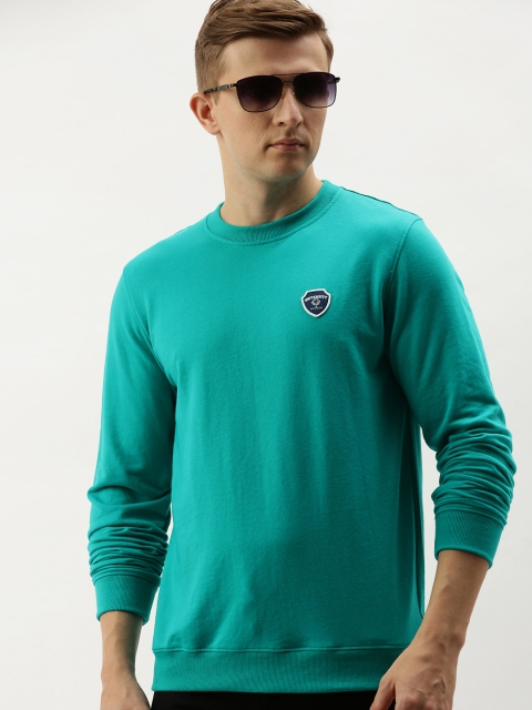 

PETER ENGLAND UNIVERSITY Men Teal Green Solid Sweatshirt