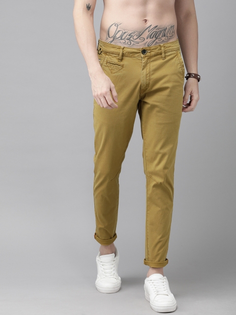 

Roadster Men Khaki Regular Fit Self Design Regular Trousers