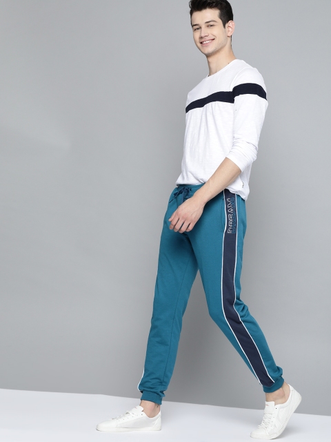

Mast & Harbour Men Teal Blue Solid Joggers