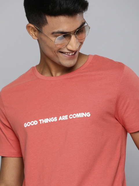 

Mast & Harbour Men Coral Red Solid Round Neck T-shirt