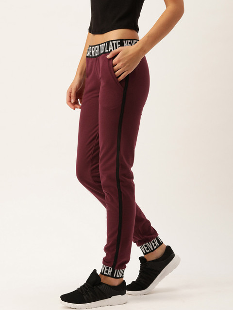 

Slumber Jill Women Maroon Comfort Fit Solid Recycled Yarn Joggers with Side Stripes