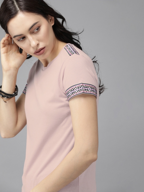 

Roadster Women Peach-Coloured Solid Round Neck T-shirt with Printed Detail Sleeve